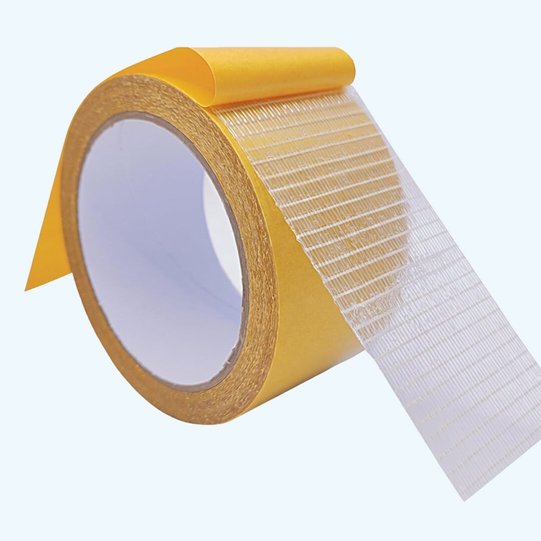 Roll of yellow adhesive tape, white background.