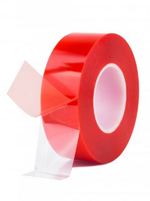 Red adhesive tape with transparent strip.