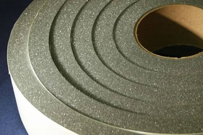 Roll of black adhesive foam tape.