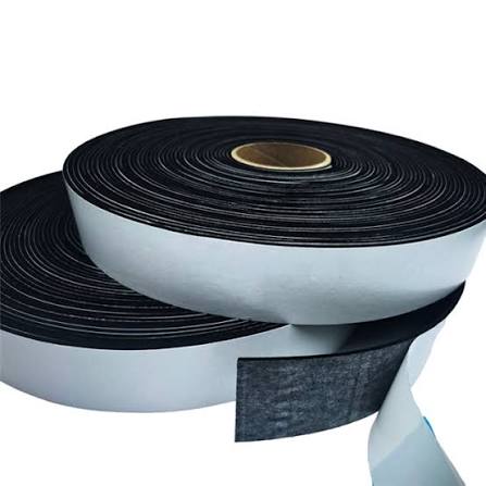 Rolls of black adhesive tape with backing.