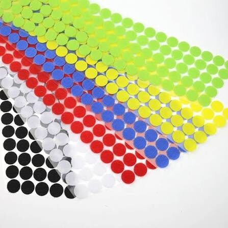 Colorful adhesive dots arranged in diagonal rows.