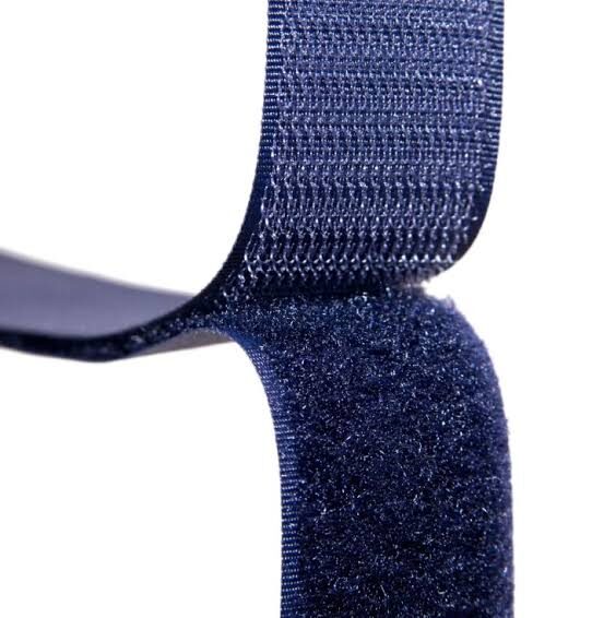 Blue hook and loop fastener close-up.
