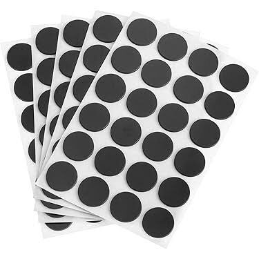 Sheets of black circular adhesive stickers.