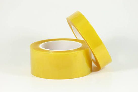 Two rolls of yellow adhesive tape.