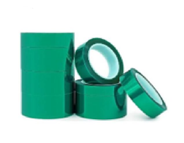 Green adhesive tape rolls, stacked and tilted.