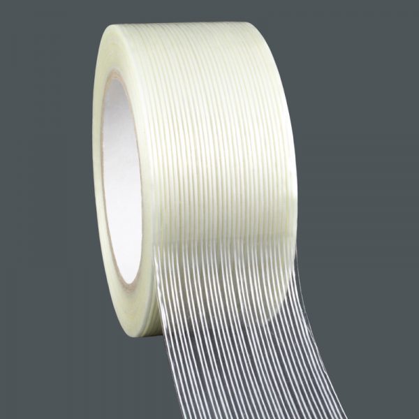 Clear strapping tape roll on gray background.