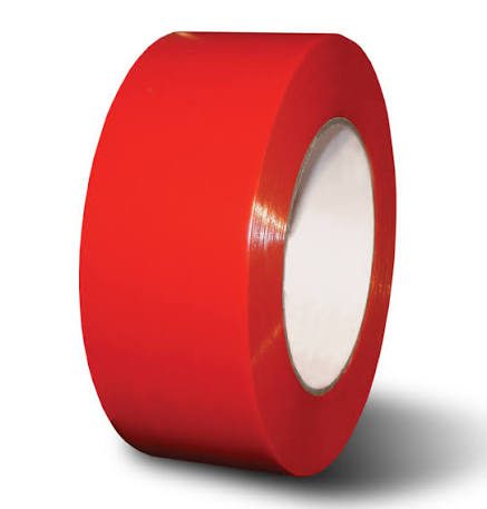 Red adhesive tape roll on white background.