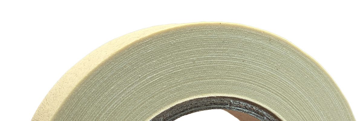 Roll of beige adhesive tape.
