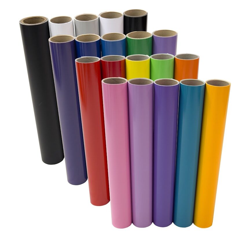 Colored vinyl rolls arranged in multiple shades.