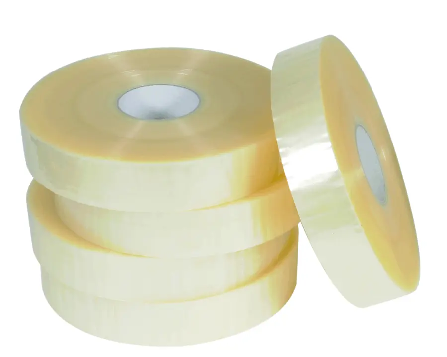 Roll of clear, transparent, double-sided, clear tape on a white background