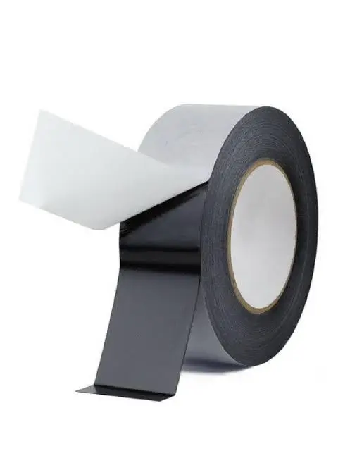 Roll of black and white tape on a white background