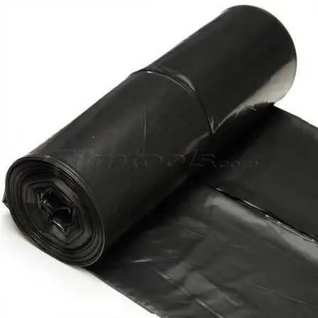 Roll of black plastic garbage bags on a white background