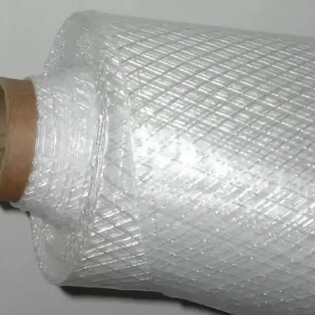 Roll of clear bubble wrap on a white background