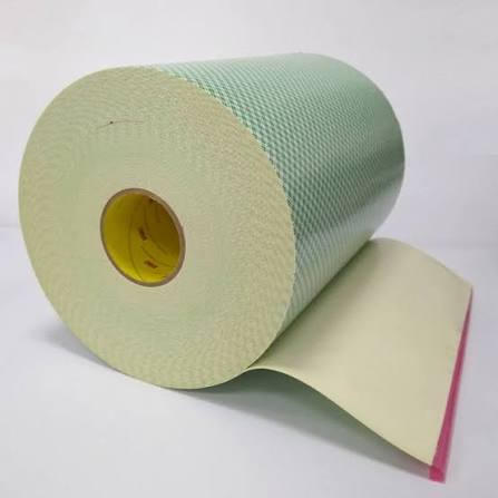 Roll of green paper on a white background
