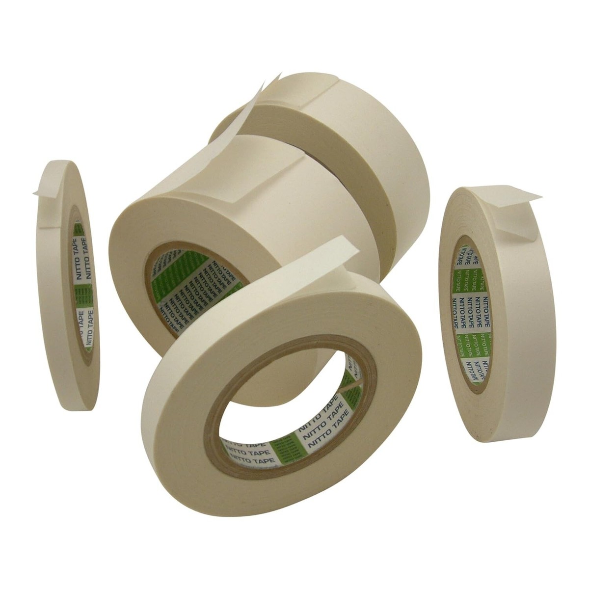 Three rolls of white masking tape on a white background