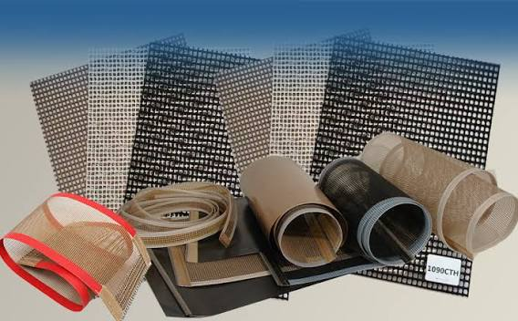Variety of different types of mesh, including a roll of mesh and a few other objects, against a blue
